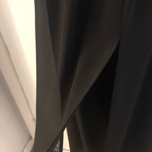 Elegant long pants/skirt - panel over pants to give the illusion of a skirt .